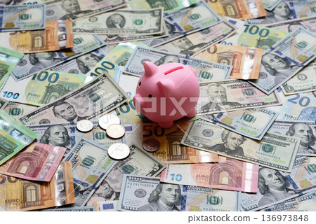 A piggy bank as a concept for storing, accumulating, and saving financial resources. A piggy bank A piggy bank as a concept for storing, accumulating, and saving financial resources. A piggy bank 136973848