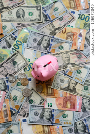 A piggy bank as a concept for storing, accumulating, and saving financial resources. A piggy bank A piggy bank as a concept for storing, accumulating, and saving financial resources. A piggy bank 136973849