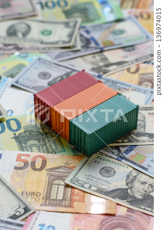 Cargo containers on the euro and dollar background as a concept for goods export. Cargo containers 136974015