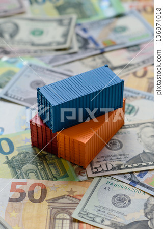Cargo containers on the euro and dollar background as a concept for goods export. Cargo containers 136974018