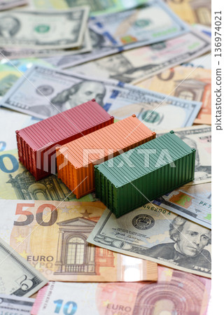 Cargo containers on the euro and dollar background as a concept for goods export. Cargo containers 136974021