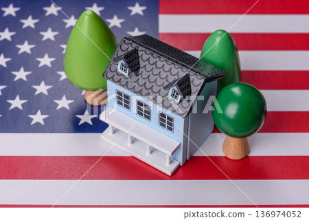Real estate, conceptual background on the US flag, renting, investing, and business. Real estate Real estate, conceptual background on the US flag, renting, investing, and business. Real estate 136974052