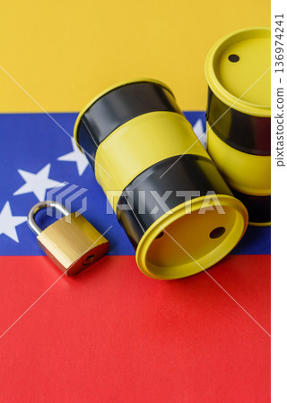 Barrels of oil, gas, or chemicals on the venezuelan flag and a ban sign. Barrels of venezuela oil Barrels of oil, gas, or chemicals on the venezuelan flag and a ban sign. Barrels of venezuela oil 136974241