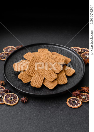 Caramel biscuit cookies, or shortbread, are a healthy breakfast food. Biscuit cookies Caramel biscuit cookies, or shortbread, are a healthy breakfast food. Biscuit cookies 136974264