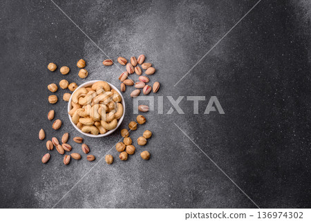 Roasted or raw cashew make a savory snack for a healthy, filling meal. Cashew nuts 136974302