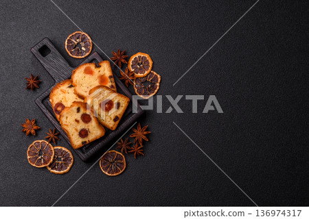 Fruit cake, a dessert with cherries, plums, and raisins for a festive Christmas table. Fruit cake 136974317