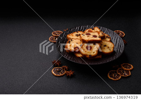 Fruit cake, a dessert with cherries, plums, and raisins for a festive Christmas table. Fruit cake 136974319