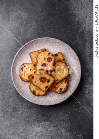 Fruit cake, a dessert with cherries, plums, and raisins for a festive Christmas table. Fruit cake 136974332