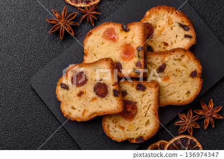 Fruit cake, a dessert with cherries, plums, and raisins for a festive Christmas table. Fruit cake 136974347