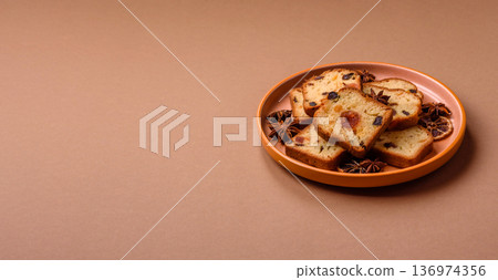 Fruit cake, a dessert with cherries, plums, and raisins for a festive Christmas table. Fruit cake 136974356