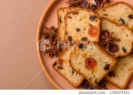 Fruit cake, a dessert with cherries, plums, and raisins for a festive Christmas table. Fruit cake 136974361