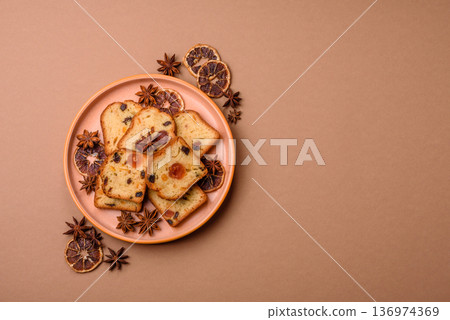 Fruit cake, a dessert with cherries, plums, and raisins for a festive Christmas table. Fruit cake 136974369