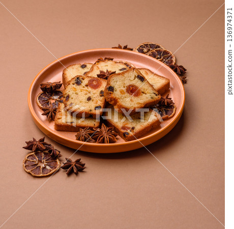 Fruit cake, a dessert with cherries, plums, and raisins for a festive Christmas table. Fruit cake 136974371