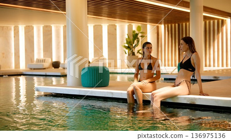 Backstage moment capturing beauty and selfassurance at pool 136975136