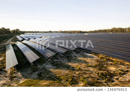 Ecology solar power station panels in fields green Ecology solar power station panels in fields green 136976913