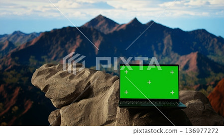 Pristine national park landscape with rocky ledges and copy space screen, forested peaks. This adventure destination is perfect for exploration, and reconnecting with nature in a majestic setting. 136977272