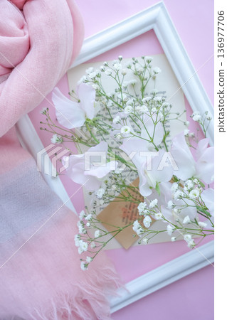 Spring image: A bouquet of baby's breath and sweet peas against a pink background Spring image: A bouquet of baby's breath and sweet peas against a pink background 136977706
