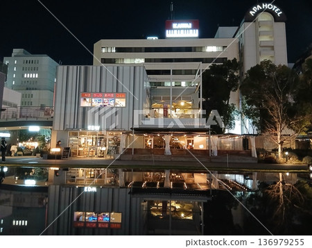 City night view and illuminated buildings reflected on the water | Winter cityscape 136979255