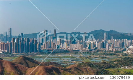 Ma Tso Lung wetlands overlooking towering Shenzhen urban skyline Feb 18 2026 136979489