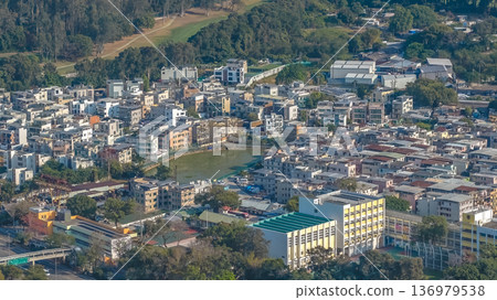 Traditional Kam Tsin Village surrounded by rural northern greenery Feb 18 2026 Traditional Kam Tsin Village surrounded by rural northern greenery Feb 18 2026 136979538
