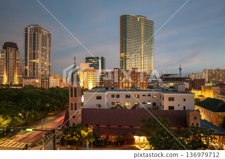 Aerial view of St Petersburg, Florida at golden hour. Coastal urban center with modern downtown district and surrounding neighborhoods. 136979712