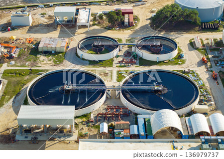 City water cleaning facility at wastewater treatment factory. Purification process of removing undesirable chemicals, suspended solids and gases from contaminated liquid 136979737