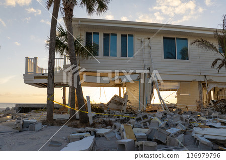 Destroyed houses on ocean coast. Hurricane Milton consequences in Englewood, Florida. Storm surge severe damage 136979796