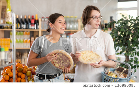 Couple choosing pizza 136980093