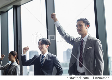 Young men and women in a suit to play guts Young men and women in a suit to play guts 136980866