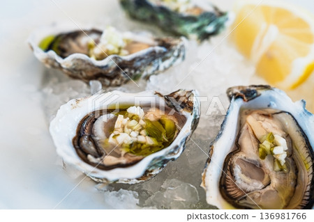 Fresh Oysters on Ice with Lemon A Culinary Delight and Gourmet Seafood Experience Fresh Oysters on Ice with Lemon A Culinary Delight and Gourmet Seafood Experience 136981766