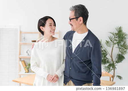 A smiling middle-aged couple 136981897