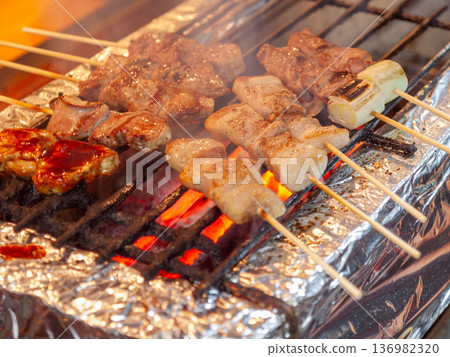Yakiton, with its fragrant charcoal fire. The glossy sauce and browned skewers of grilled pork are sure to whet your appetite. Yakiton, with its fragrant charcoal fire. The glossy sauce and browned skewers of grilled pork are sure to whet your appetite. 136982320
