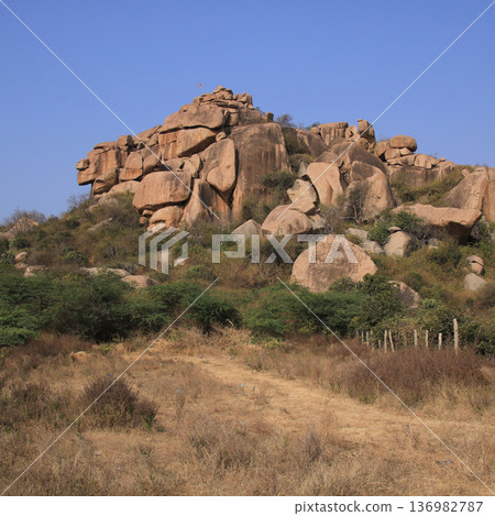 Granite hill in Basapur, Karnataka, India. 136982787