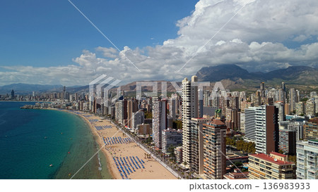Aerial view of Benidorm skyline and Levante beach coastline with Mediterranean sea Spain 136983933