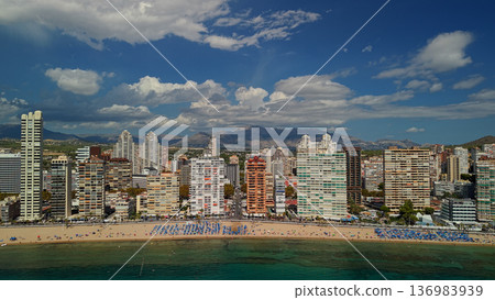 Aerial panoramic view of Benidorm beachfront skyline with sandy beach and Mediterranean Sea Spain 136983939