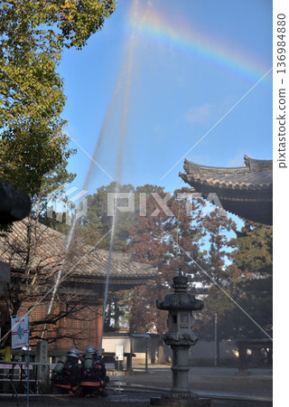 Fire drill: Water spraying on the main hall of Kakurinji Temple 136984880