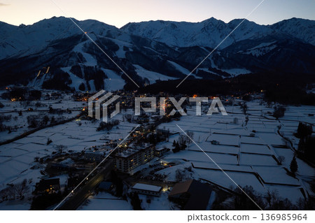 Beautiful sunset in Hakuba, Hakuba Village, Nagano Prefecture (aerial shot by drone) 136985964