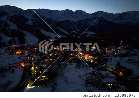 Beautiful night view of Hakuba Village, Nagano Prefecture (aerial shot taken by drone) Beautiful night view of Hakuba Village, Nagano Prefecture (aerial shot taken by drone) 136985973