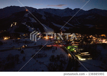 Beautiful night view of Hakuba Village, Nagano Prefecture (aerial shot taken by drone) Beautiful night view of Hakuba Village, Nagano Prefecture (aerial shot taken by drone) 136985991