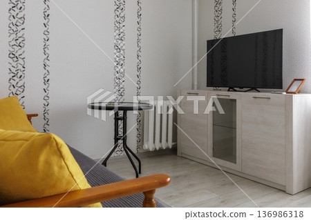 Living Area with TV Stand and Small Coffee Table 136986318