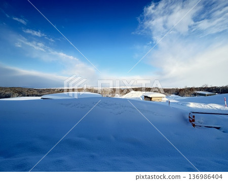 Hokkaido's snowy plains and blue skies Hokkaido's snowy plains and blue skies 136986404