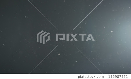 background of floating particles in air over black background and lens flare 136987351