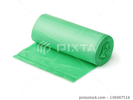 Roll of green biodegradable plastic garbage bags Roll of green biodegradable plastic garbage bags 136987516
