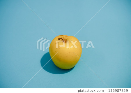 Fresh Apple on a Creative Pastel Blue Background 136987839