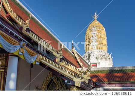 View of Wat Phra Si Rattana Mahathat Woramahawihan, Phitsanulok, there is a beautiful ancient standing Buddha image and Phra Buddha Chinnarat is a sacred object that Thai people respect. 136988611