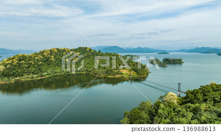 The suspension bridge is emphasizes beauty for tourism. A suspension bridge is a bridge that is difficult to calculate in the construction of engineers. 136988613
