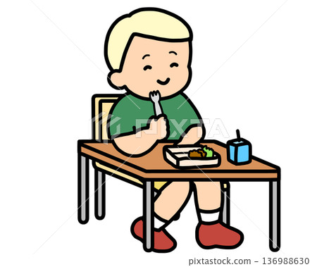 Blonde boy eating lunch with a fork in classroom Blonde boy eating lunch with a fork in classroom 136988630