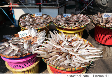 Traditional asian street food - salted fish, Thailand, Southeast Asia. Fresh sea food on morning street fish market Traditional asian street food - salted fish, Thailand, Southeast Asia. Fresh sea food on morning street fish market 136988912