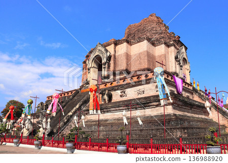 Famous sightseeing landmark - Wat Chedi Luang Temple in Chiang Mai, Thailand. Wat Chedi Luang is a Buddhist temple in historic center of Chiang Mai. Topic of vacation, travel, trip, cruises, tour 136988920