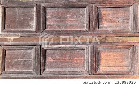Texture of vintage wood shutters with decorative border. Vertical or horizontal retro background with old wooden planks and copy space for text. Mock up template 136988929